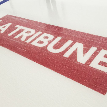 Bishop’s University sign installed under the skating rink ice