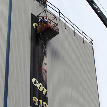 Large format print on Côté Girard Mill outdoor wall