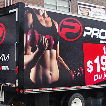 Pro Gym cube van wrap serving as mobile advertising billboard for promotions